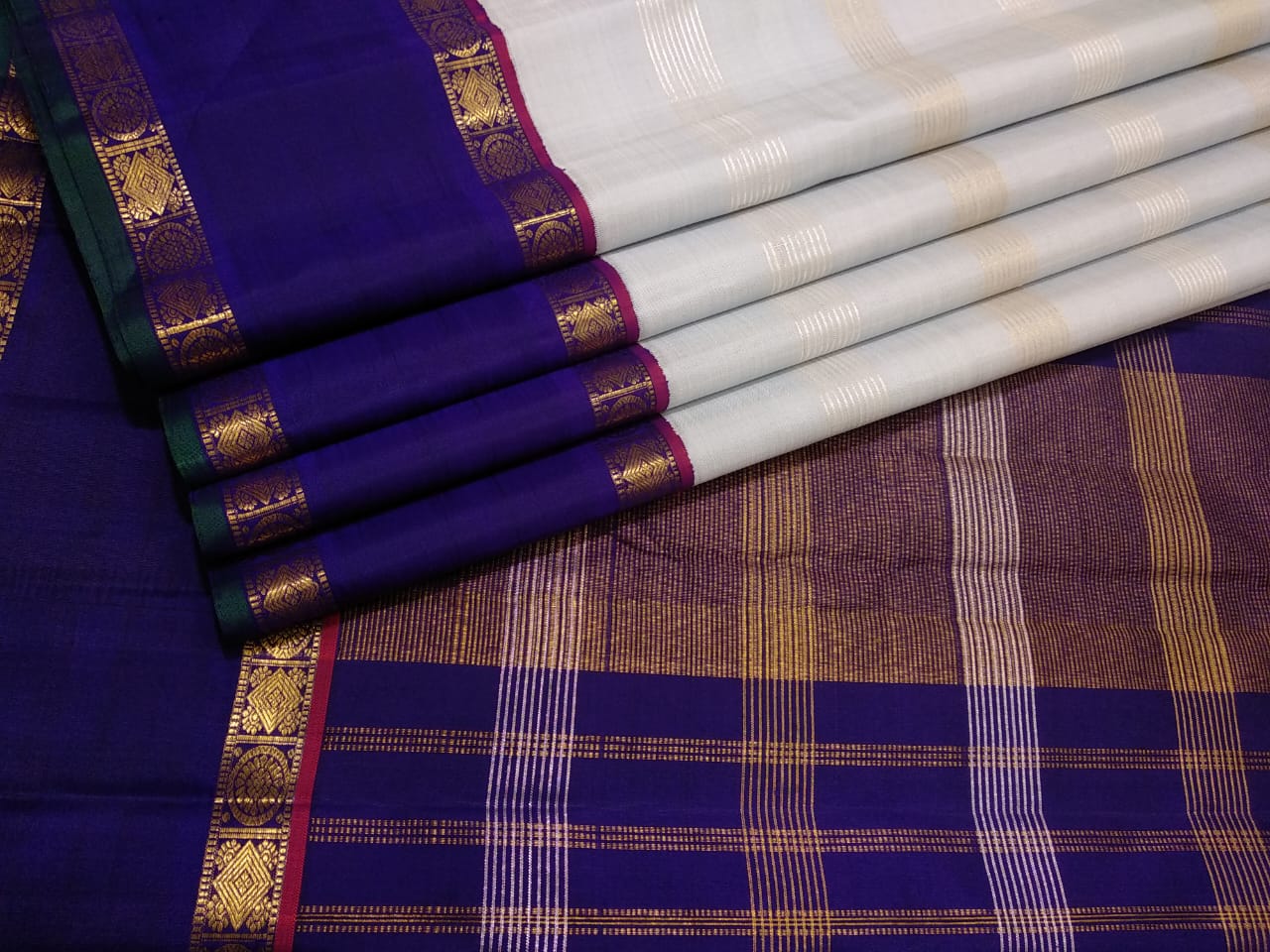 Traditional Korvai Borders with Silver zari & Golden zari stripes on Body