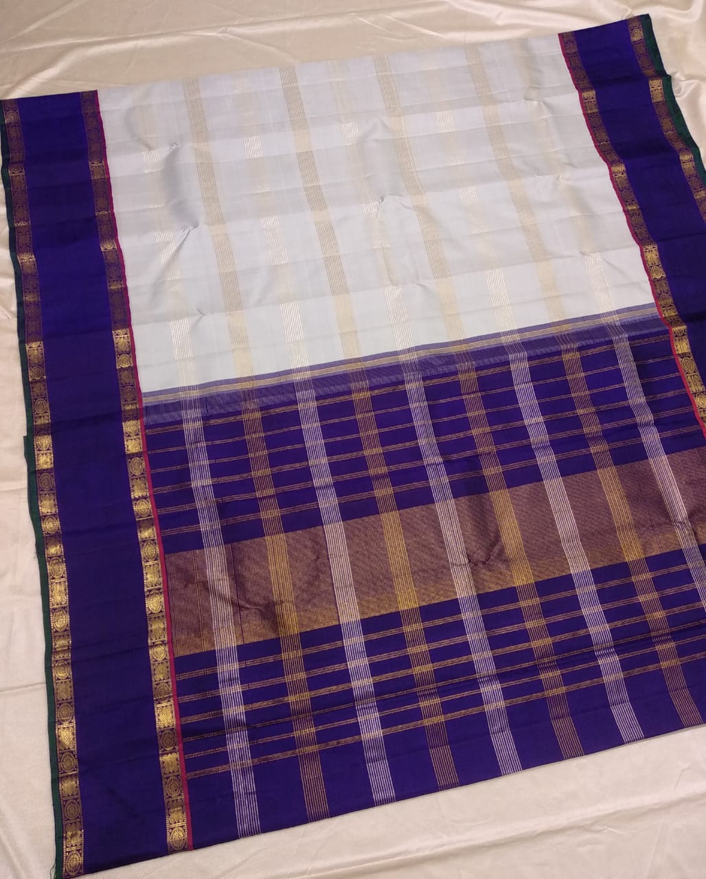 Traditional Korvai Borders with Silver zari & Golden zari stripes on Body