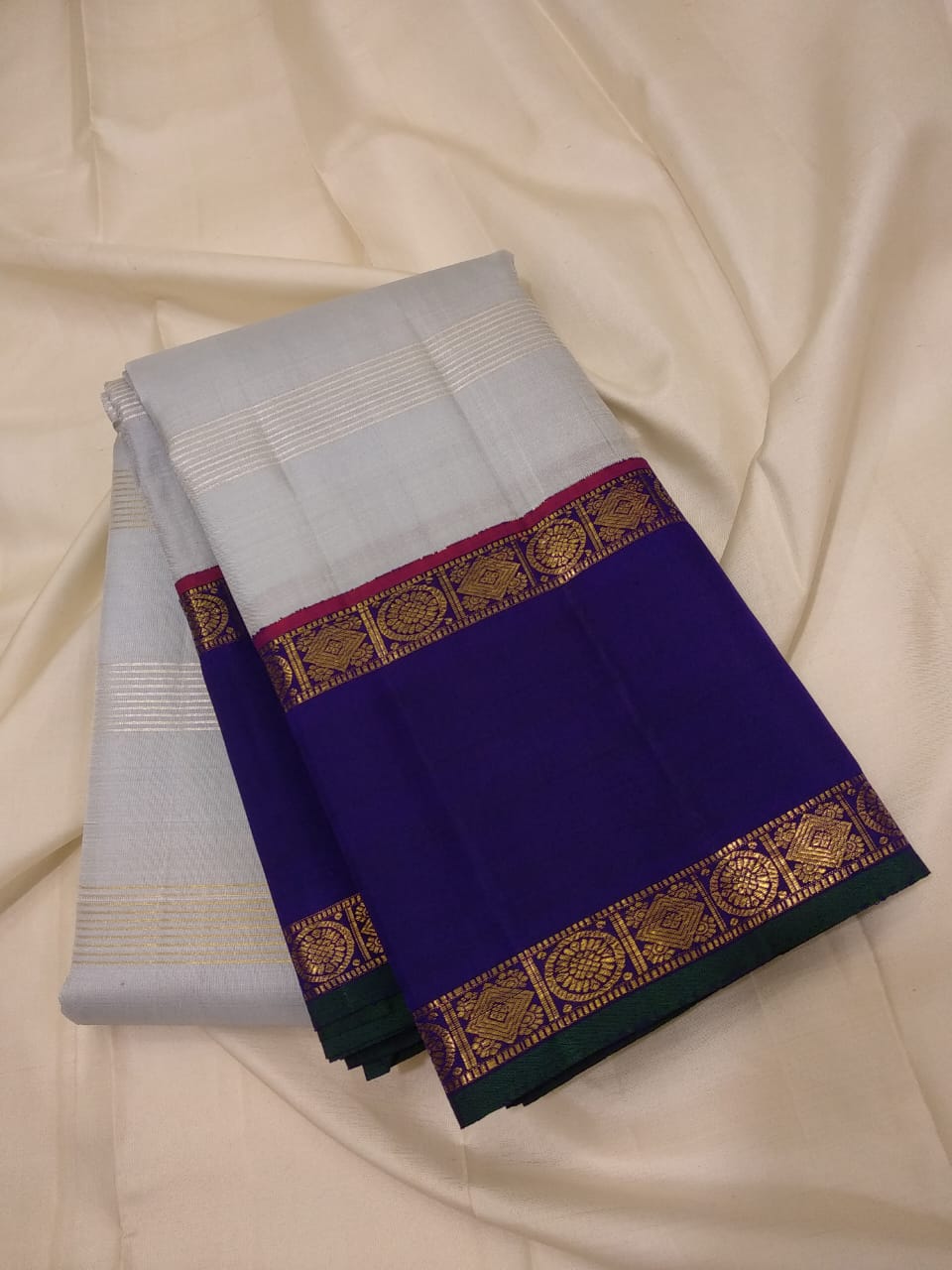 Traditional Korvai Borders with Silver zari & Golden zari stripes on Body