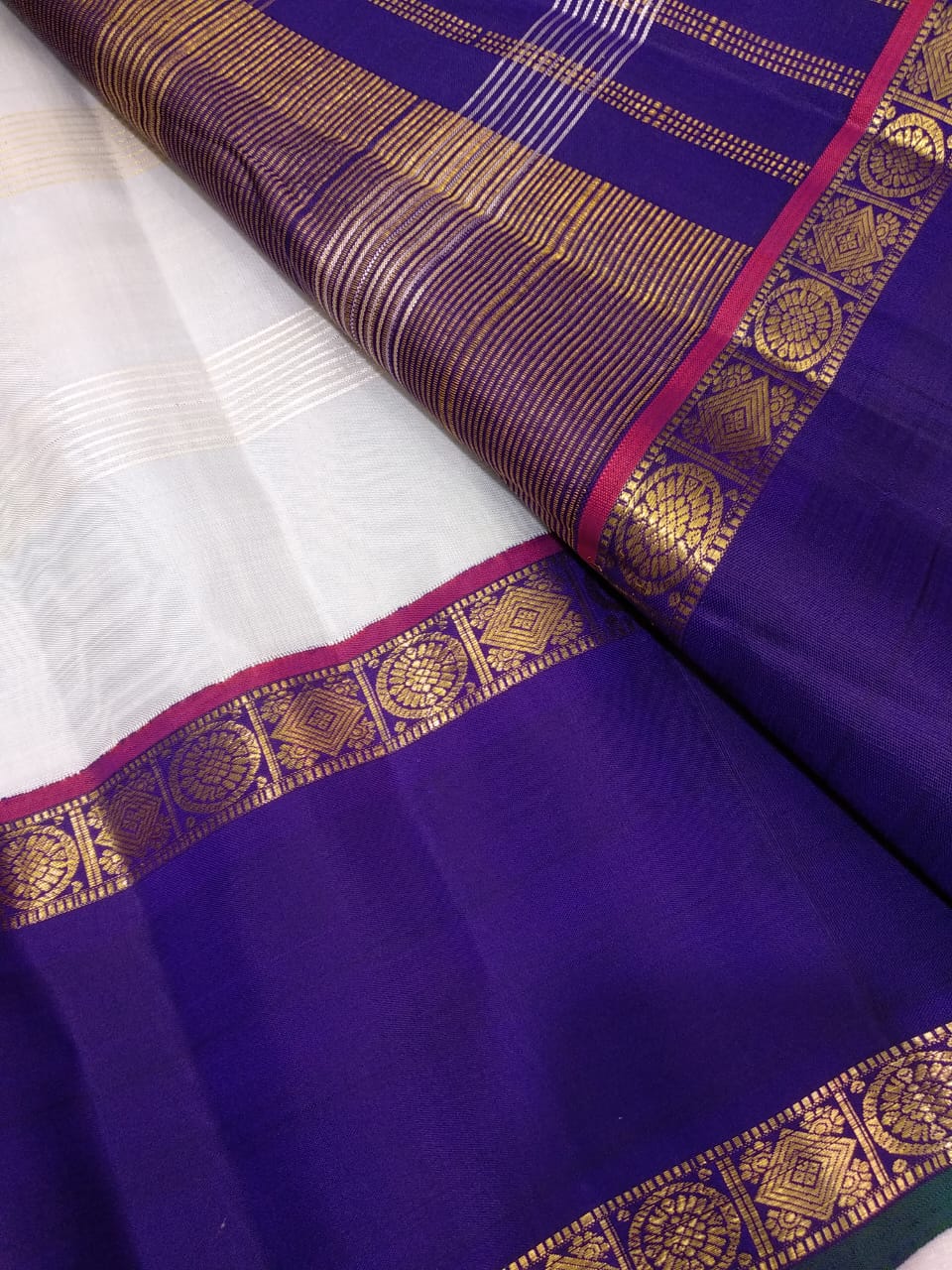 Traditional Korvai Borders with Silver zari & Golden zari stripes on Body