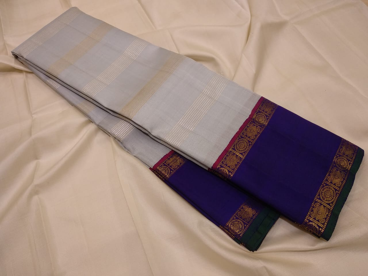 Traditional Korvai Borders with Silver zari & Golden zari stripes on Body