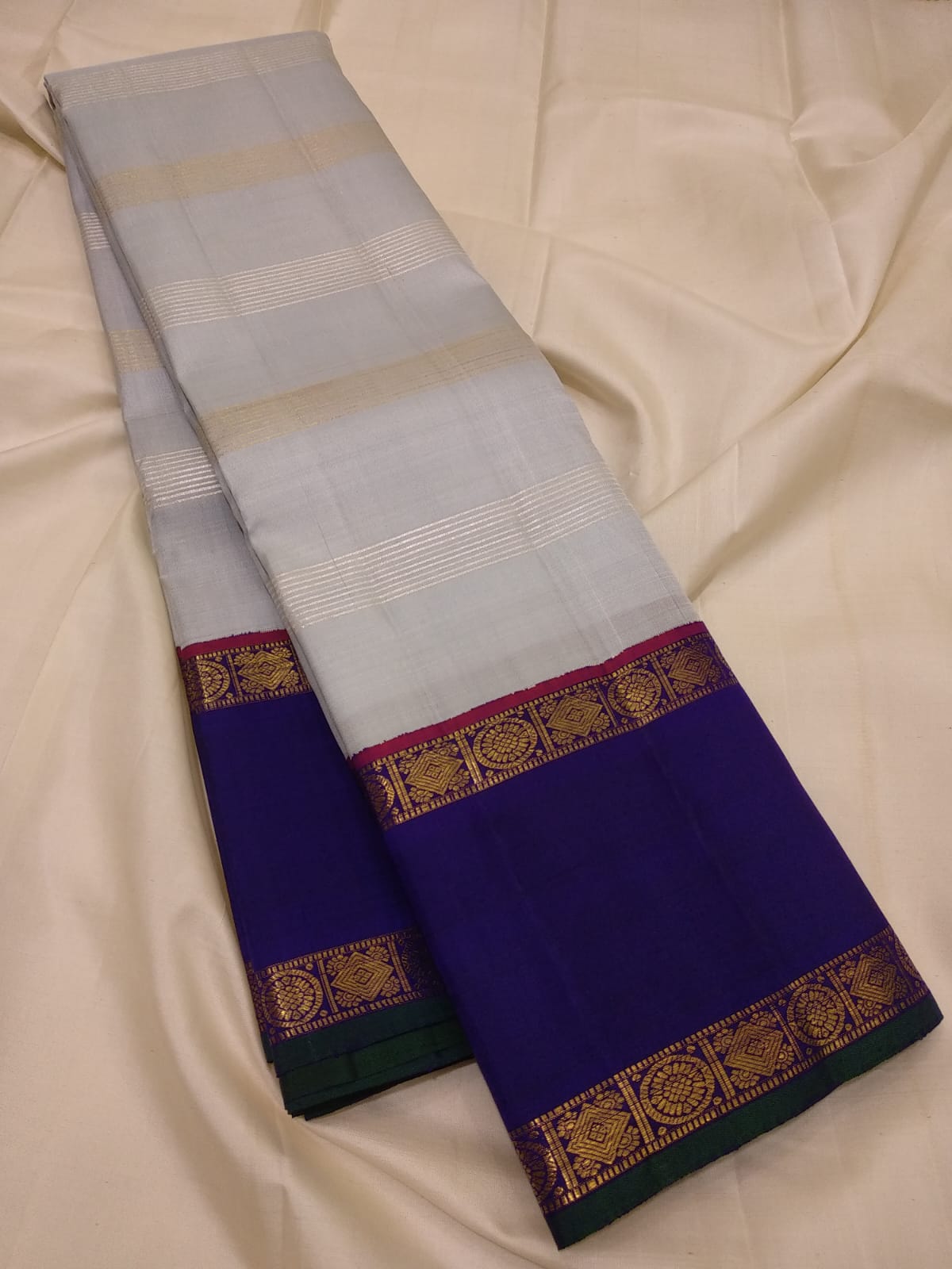 Traditional Korvai Borders with Silver zari & Golden zari stripes on Body
