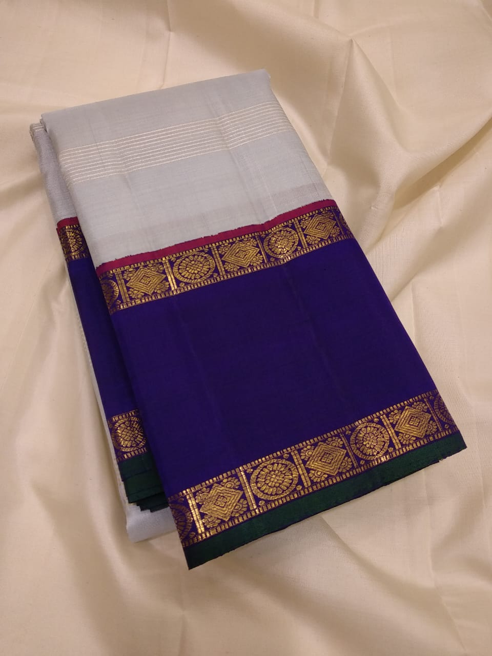 Traditional Korvai Borders with Silver zari & Golden zari stripes on Body