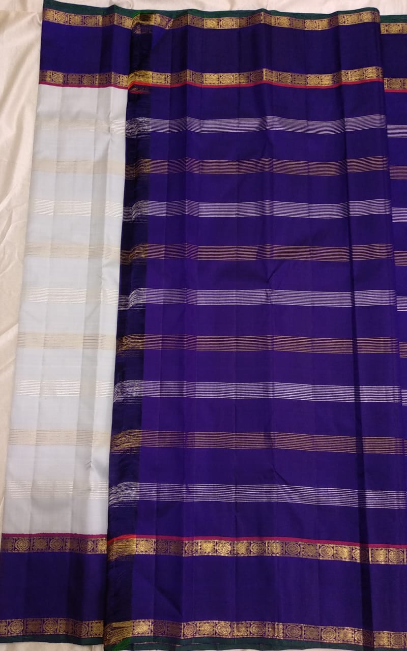 Traditional Korvai Borders with Silver zari & Golden zari stripes on Body